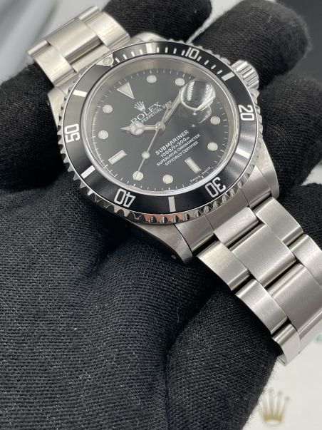 Rolex Submariner 16610 with Paper from 1999