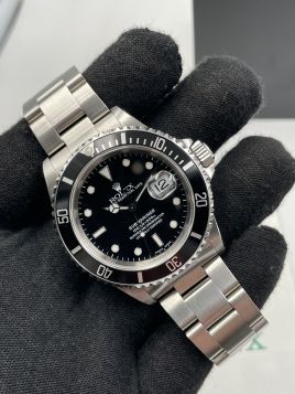 Rolex Submariner 16610 with Paper from 1999